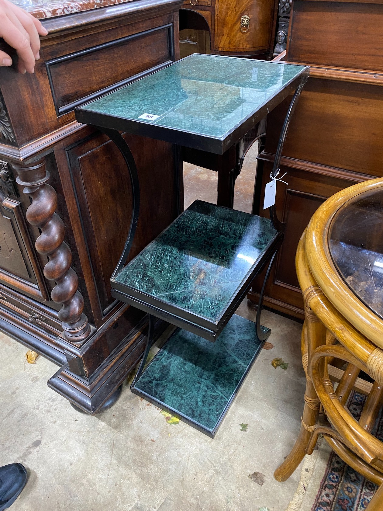 A pair of two tier wrought iron and green marble two tier occasional tables, width 30cm, depth 45cm, height 46cm
